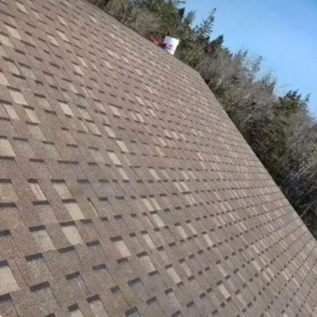 New roof installation of a architectural designed shingle.