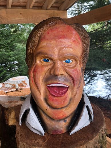 Chris Farley chainsaw carving