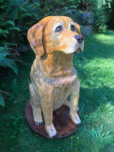 dog chainsaw carving