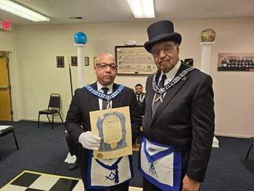 Brother Derrick Jones receiving his "Birth Certificate" 2026