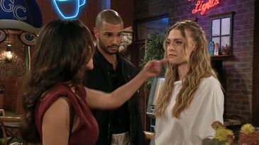 Audra flicks Claire’s chin as she threatens her as Holden watches on The Young and the Restless