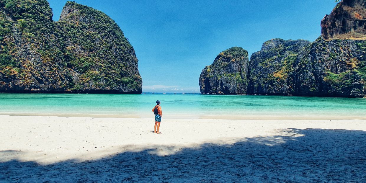 Shirtless man standing on Beautiful beach 