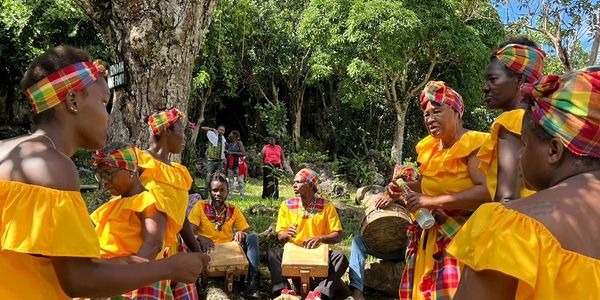 Maroons performing ceremony under the Kindah Tree, in Accompong Town, Cockpit Country, Jamaica.