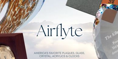 Airflyte logo with elegant plaques and awards in the background.