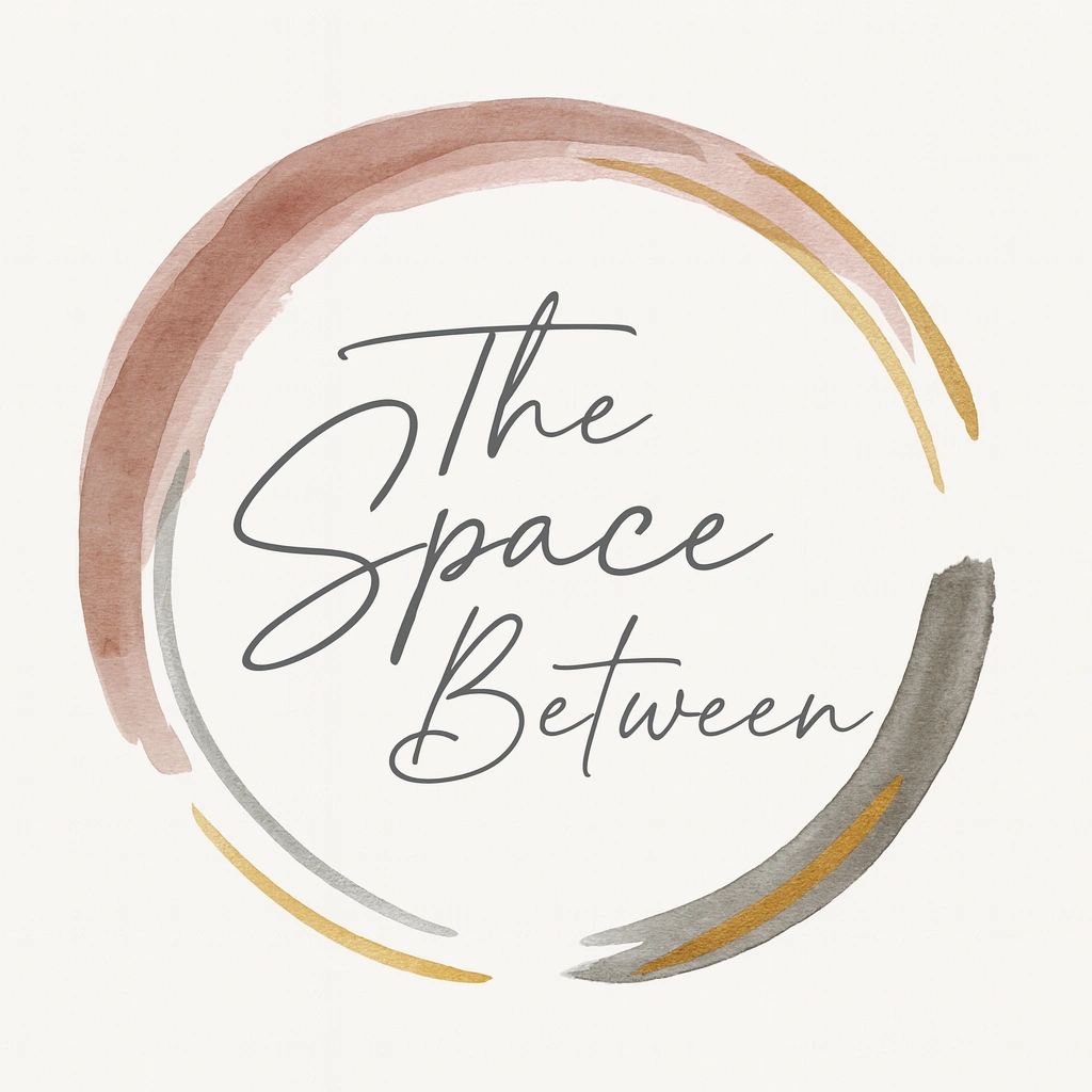 Elegant watercolor circle with 'The Space Between' text in the center.