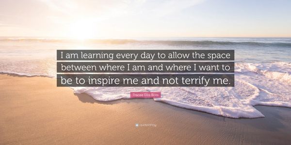 Inspirational quote on a serene beach at sunrise about embracing growth without fear.