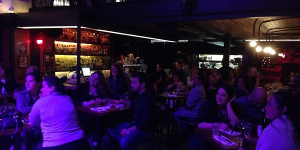 Crowd laughing at a live stand-up comedy night in Montreal at MTLCOMEDYCLUB.