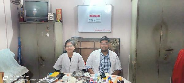 Dr. Kaustav Mukherjee and Dr. Sanchari Maity at Free Dental Check Up Camp attending Patients