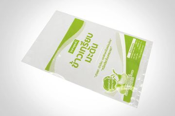 Empty plastic packaging with green and white design.