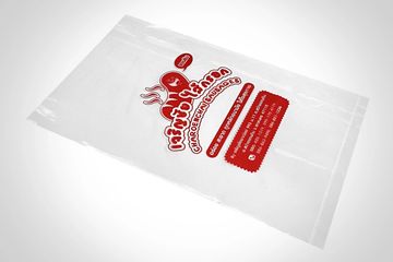 Clear plastic bag with printed red text and graphics.