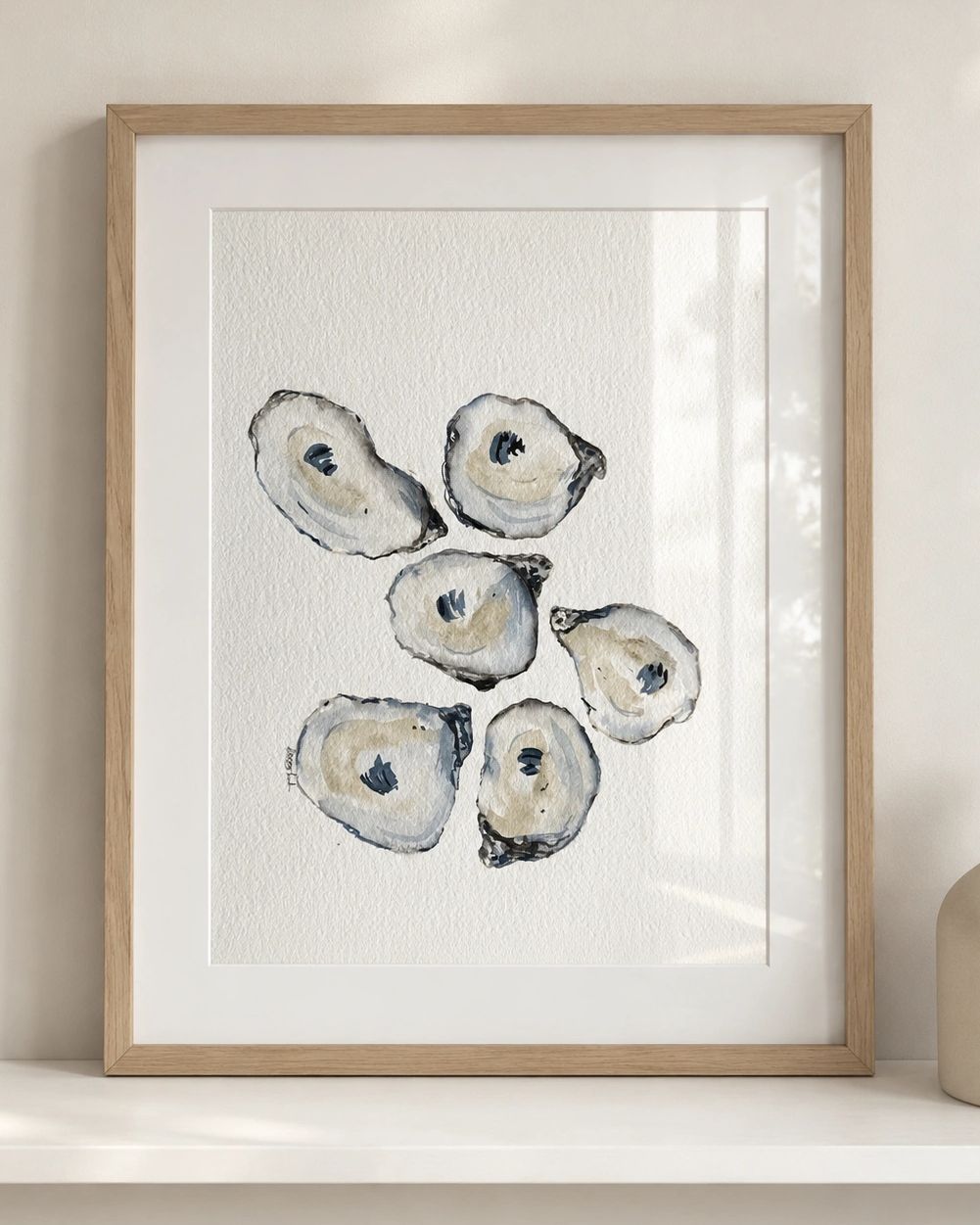 Framed watercolor painting of six oysters.
