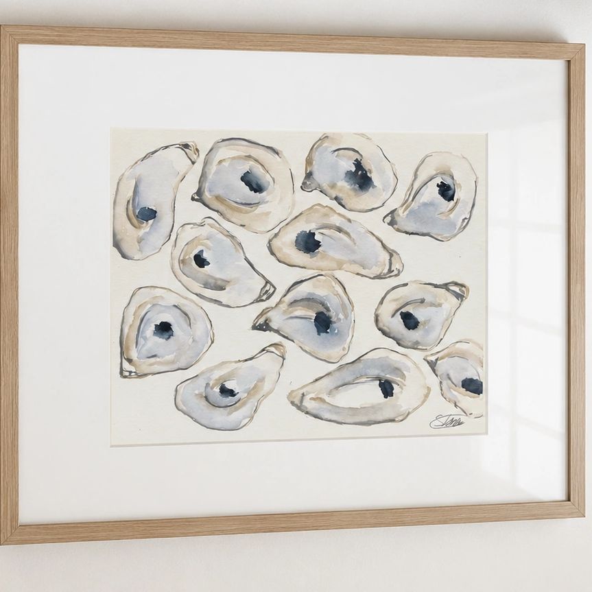 Framed watercolor painting of oyster shells.