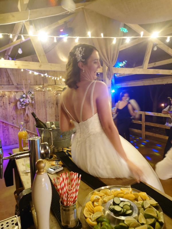 Bride enjoys wedding bar