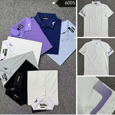 A collection of polo shirts in various colors with a distinct logo on the collar.