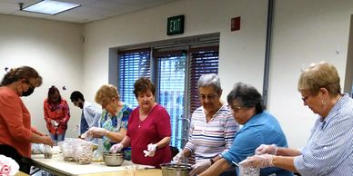 Image of club members assembling Friendship Soup 