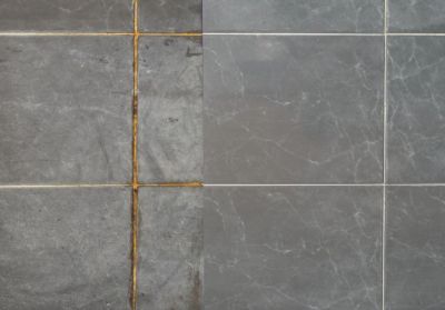 Comparison of dirty and clean tiled floor.