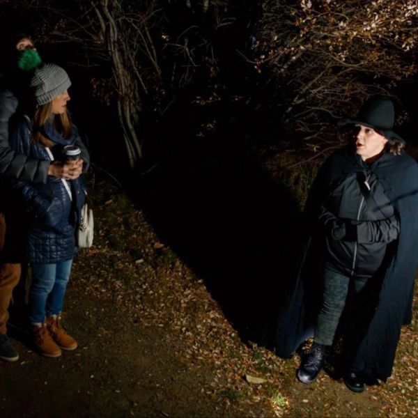 Maxine and guest standing in front of Policeman's creek