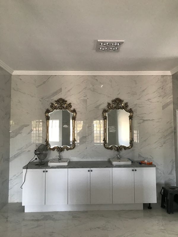 Every bathroom needs a heat lamp on those cooler days and nights.