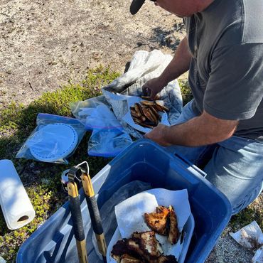 Lunch made from fresh caught Northern Pike on the shore of Crystal Lodge on Cree Lake 