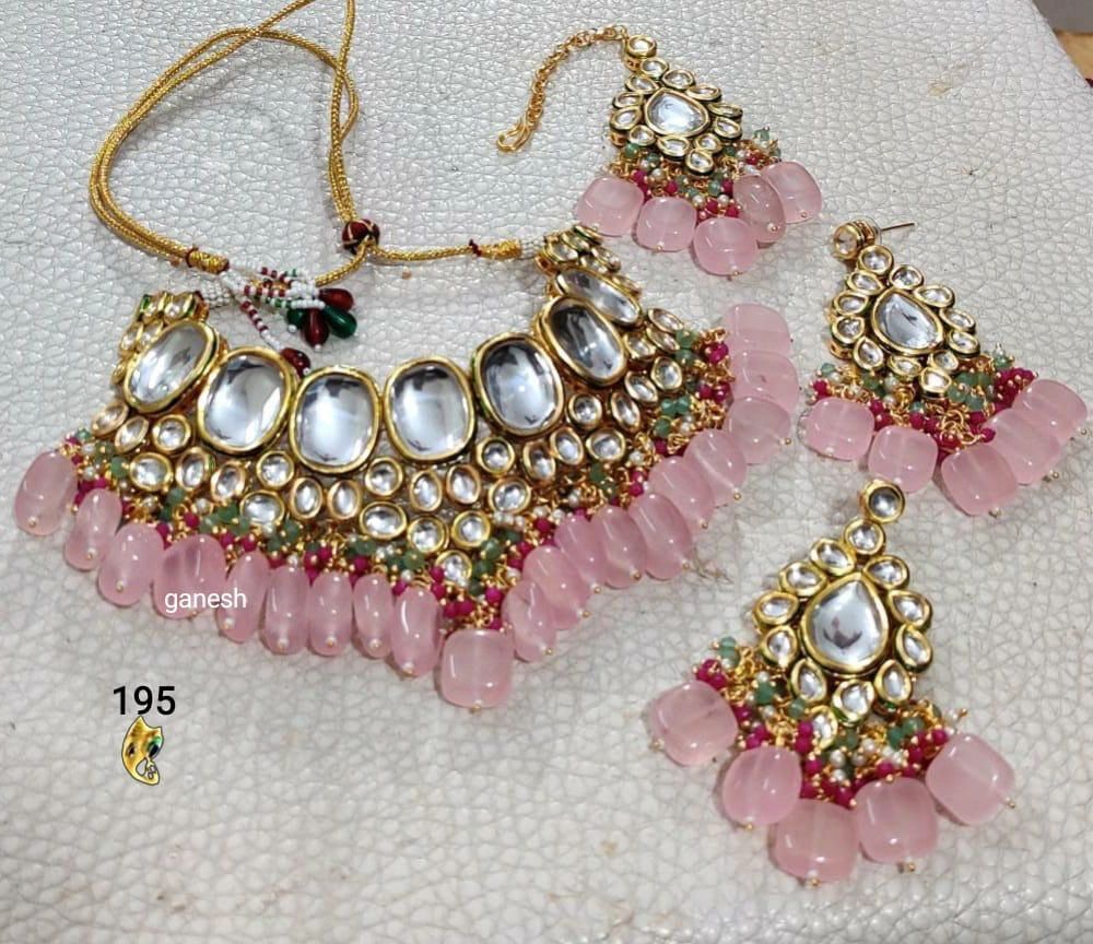 Pink Elegant kundan choker with earrings and mangtika