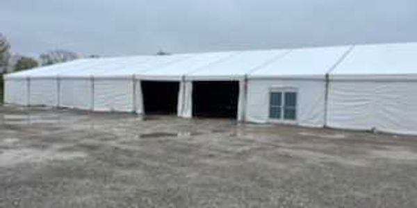 Warehouse tent structure at a construction jobsite from construction tent rentals