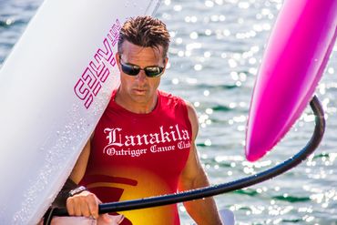 Outrigger canoe paddler in motion