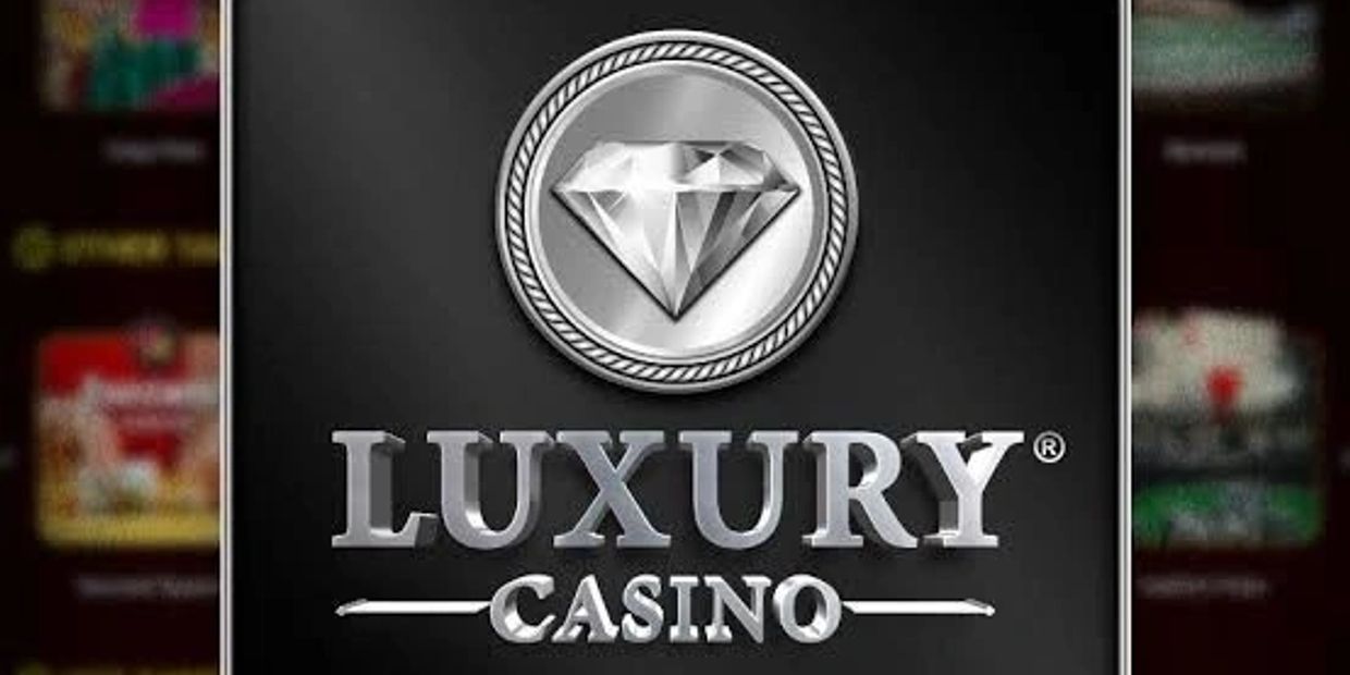 Luxury Casino logo with a diamond emblem on a black background.