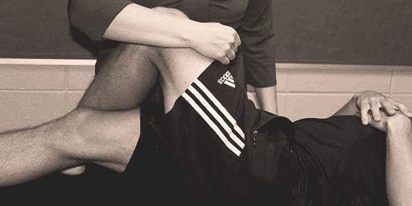 Physical therapy session focusing on leg rehabilitation.