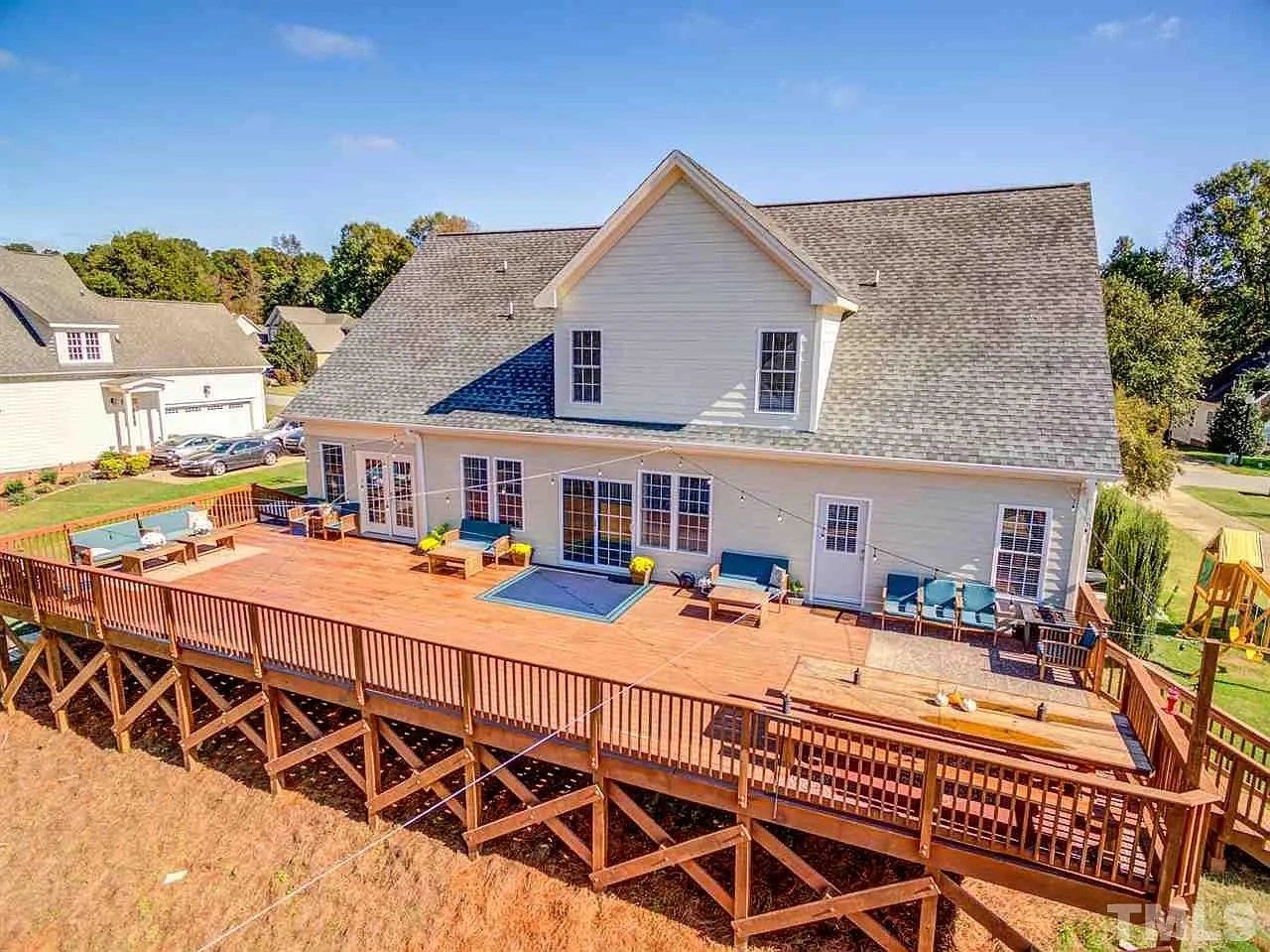 This phenomenal property was drab and unremarkable prior to the many renovations Vankirk Home Upgrades completed. Remodels were done in phases over time to facilitate the client's budget, and minimize disruption of family routines and living conditions. The end result was a complete remodel but the addition of an enormous back deck that fully embraced the previously un-usable steep area immediately behind the home, making the breathtaking, scenic pond and gold course views the rightful star of the home. The layout flaws, lack of rear windows, doors, or any outdoor area to enjoy the unique and coveted benefits this lot actually had to offer, were corrected, quickly making this once outdated and unwanted home, the gathering place for neighborhood and family cookouts, celebrations, and enjoyment. The added windows and glass doors allowed the sunlight to brighten the interior of the home as well, and the artistic colors of the horizon to grace the every room of this home each evening. This house was reborn into a home that facilitated family time that will be forever cherished, and memories of the previously walled off dark rooms are nearly forgotten by the overwhelming splendor of the beautiful pond waters and expansive far-reaching vistas of rolling golf course hills in Clayton, NC.