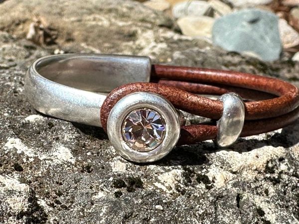 Greek silver and leather bracelet with European crystal.  Comes in black or brown leather.