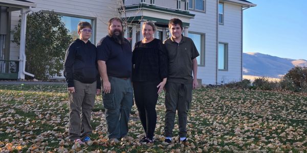 Sommer family in front of the Cook Mansion