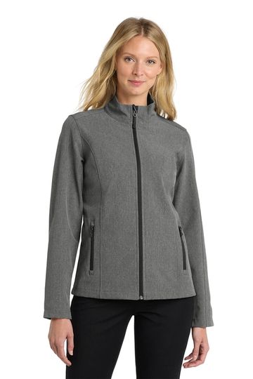 Woman modeling a gray zip-up jacket with black pants.