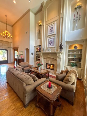 Cozy living room with fireplace and elegant decor.