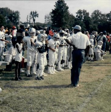 Coach Mo with his beloved Aberdeen Raiders- "The Team that Won't Be Beat Can't Be Beat."