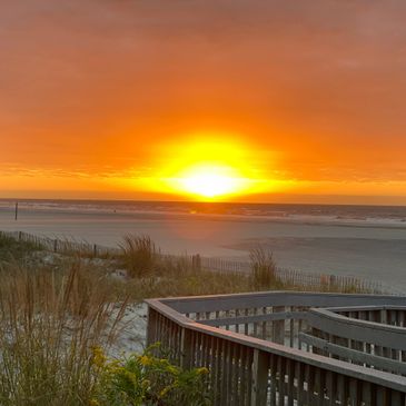 This image shows a beautiful down beach sunrise!