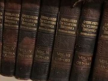 Close-up of volumes in a vintage encyclopedia set.