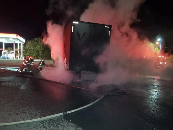 Local Fire Department attacks trailer fire.