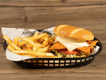 Warm Brioche Bun, Chicken Strips Topped With Lettuce, Tomato & Mayo With Your Choice of Golden Fries