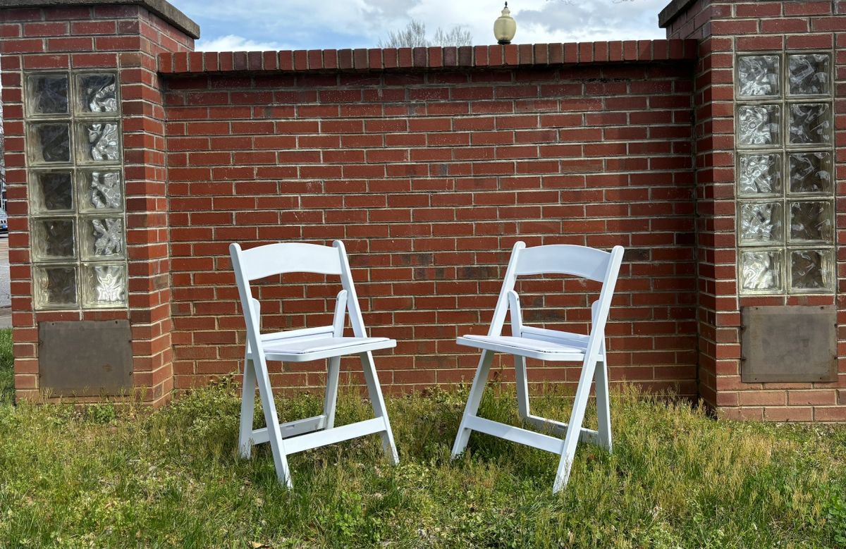 Royalty Rentals White Resin Chairs