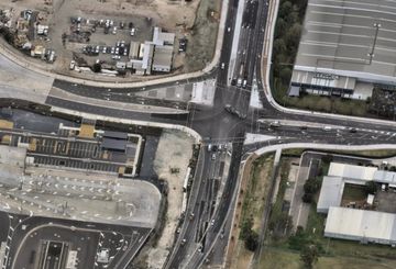 Aerial view of a busy road intersection.