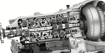 Cutaway view of a car's automatic transmission showing internal gears and components. automatic transmission repair