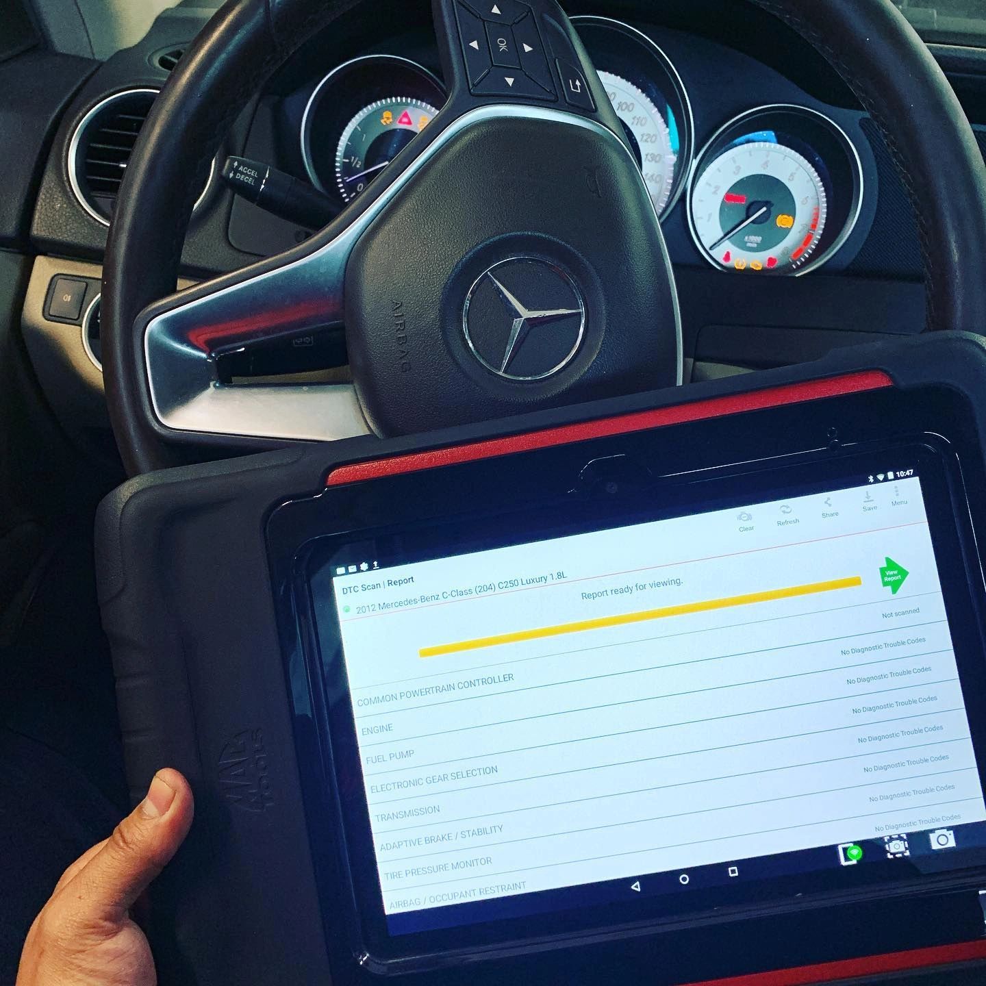 Computer diagnostic on a Mercedes.