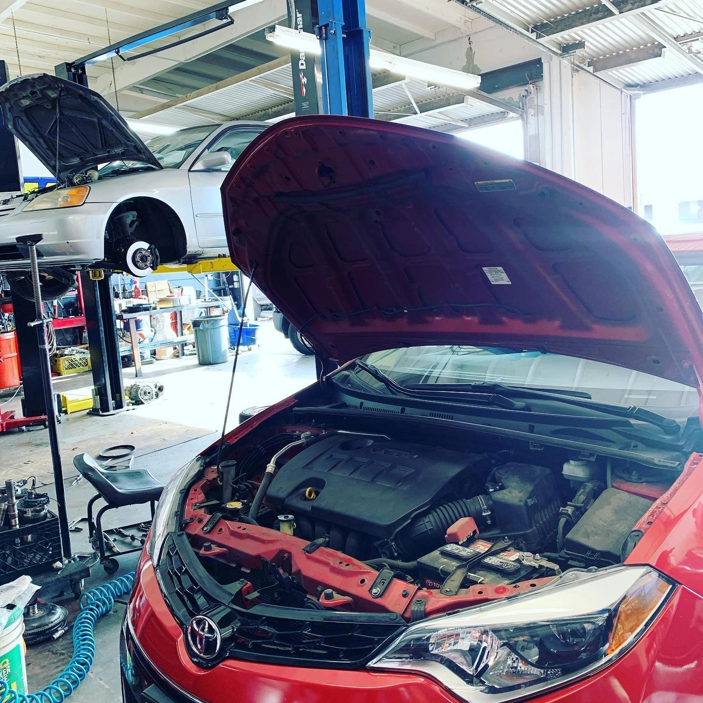 Oil change on a Toyota and transmission service on a Honda