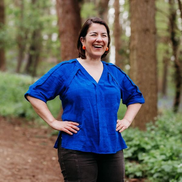Elspeth Fimpel, founder of Joyful Outdoors, in the woodland of Surrey, 
