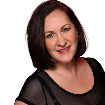Smiling woman with dark hair and sheer top.