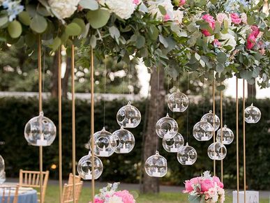 votives, taper candles, table numbers, hanging globes, hurricane vases, compote bowls, chandeliers