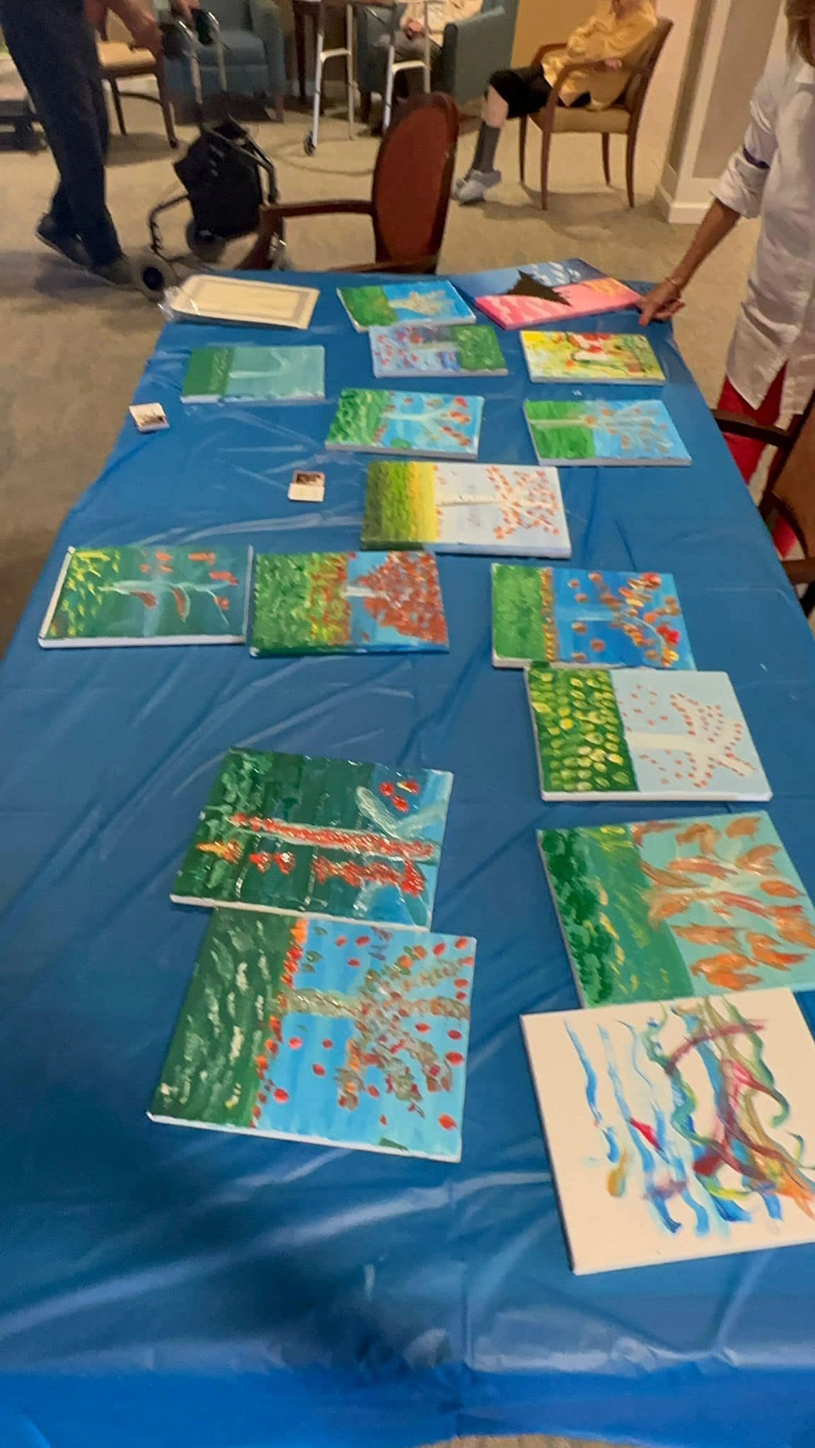 Table of artwork created by workshop participants.