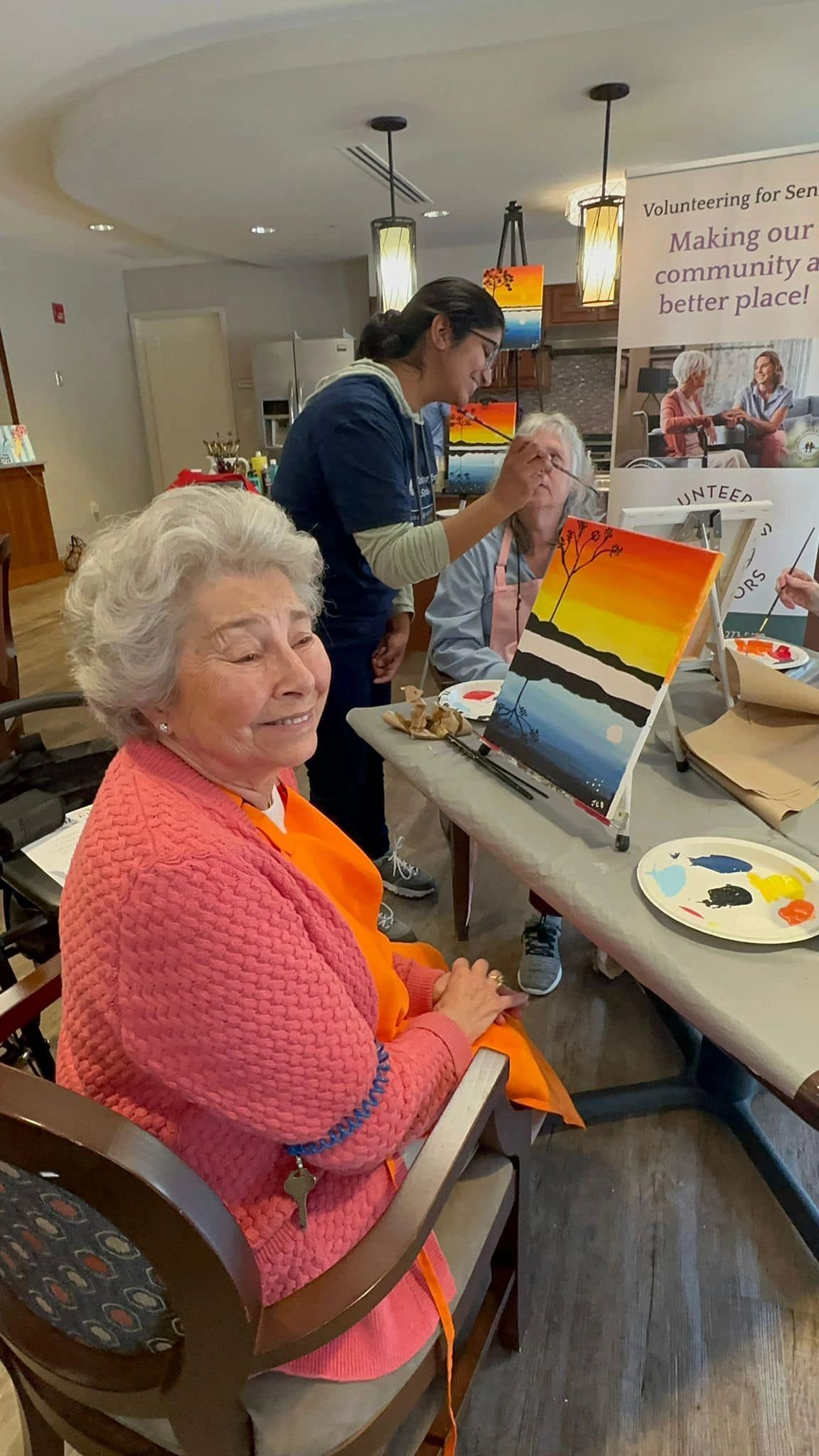 workshop participant working on painting.