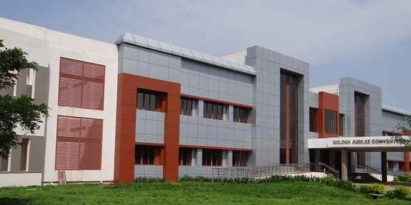 Modern convention center building with clean architectural design.