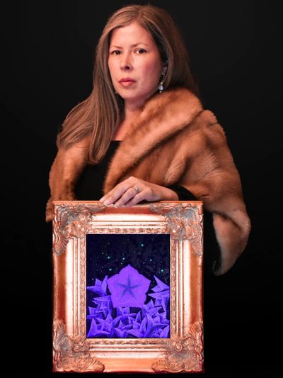 Mvskoke Artist Andrea Day portrait with blacklight version of Fireflies